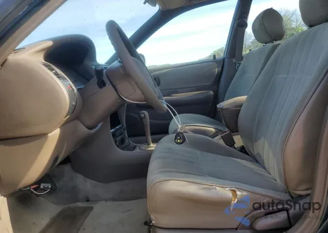 1997 Toyota Corolla Base z USA, uszkodzony, nr VIN 2T1BA02E2VC168752